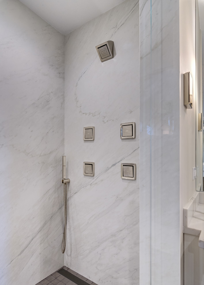 Huge minimalist master porcelain tile and gray floor alcove shower photo in Chicago with flat-panel cabinets, white cabinets, a one-piece toilet, an undermount sink, quartz countertops, a hinged shower door and white walls