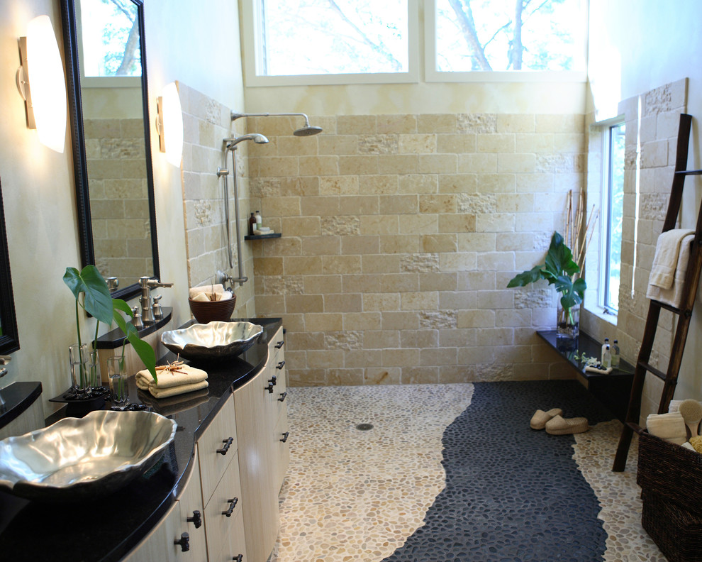 Transitional bathroom in Other with furniture-like cabinets, an open shower, beige tile, pebble tile floors, a vessel sink and an open shower.