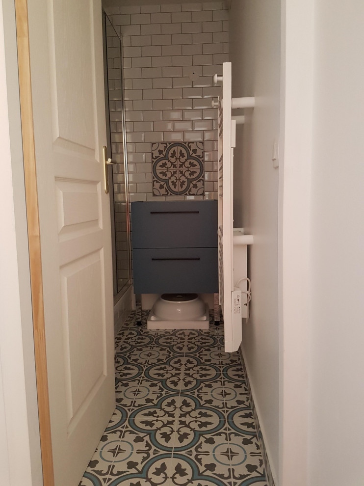 Inspiration for a small midcentury 3/4 bathroom in Grenoble with beaded inset cabinets, blue cabinets, a curbless shower, white tile, subway tile, white walls, cement tiles, a vessel sink, wood benchtops, grey floor, a sliding shower screen, grey benchtops, a single vanity, a freestanding vanity and coffered.