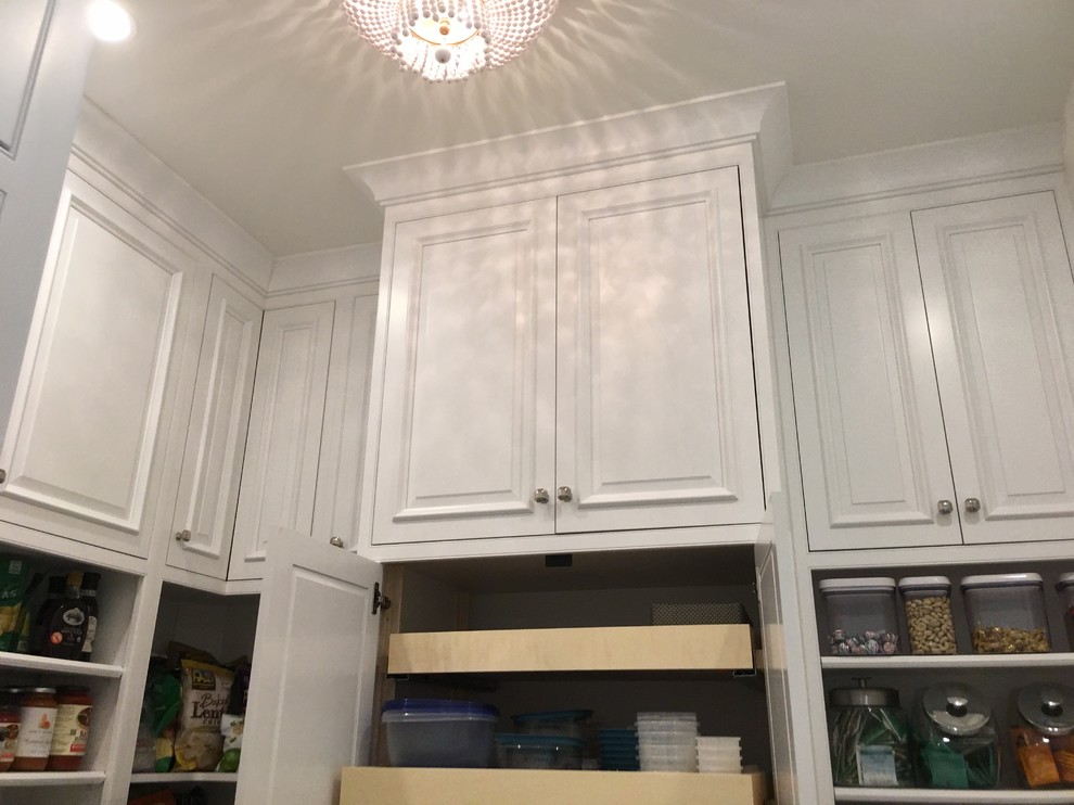 Inspiration for a large transitional u-shaped marble floor and white floor eat-in kitchen remodel in Miami with an undermount sink, recessed-panel cabinets, white cabinets, marble countertops, gray backsplash, stone tile backsplash, paneled appliances and an island