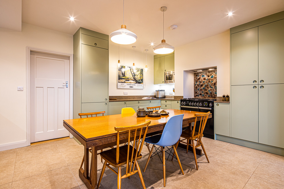 Photo of a medium sized contemporary u-shaped kitchen/diner with an integrated sink, flat-panel cabinets, green cabinets, laminate countertops, brown splashback, glass sheet splashback, integrated appliances, porcelain flooring, no island, beige floors and brown worktops.