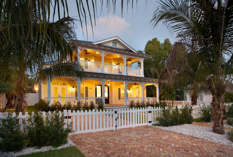 This is an example of a traditional exterior in Miami with wood siding.