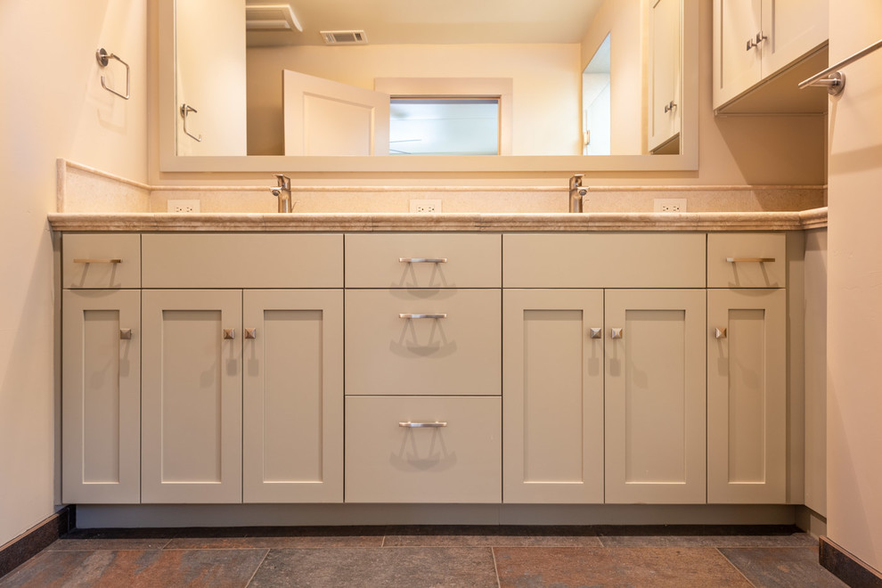 Mid-sized arts and crafts master bathroom in San Luis Obispo with shaker cabinets, beige walls and a drop-in sink.