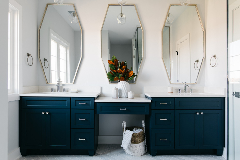 Design ideas for a country bathroom in Chicago with shaker cabinets, blue cabinets, white walls, marble floors, an undermount sink, white floor, white benchtops and a double vanity.