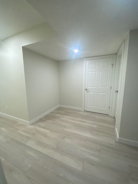Transitional home design photo in Edmonton