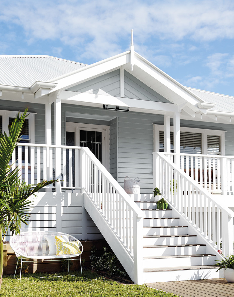 Design ideas for a large beach style two-storey grey exterior in Melbourne.