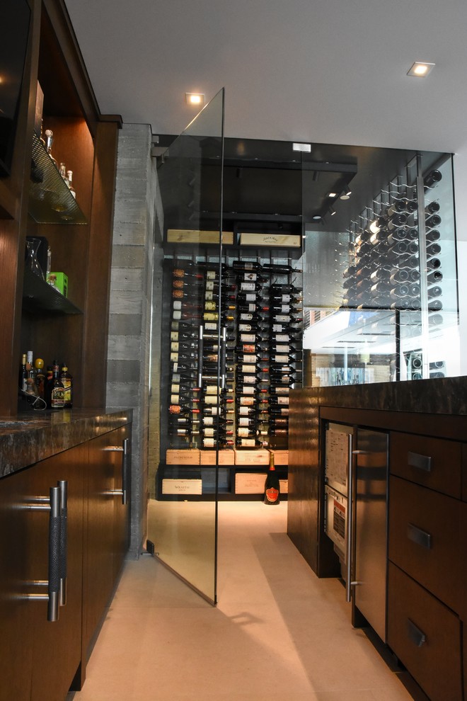 Design ideas for a mid-sized contemporary wine cellar in Orange County with ceramic floors, display racks and beige floor.