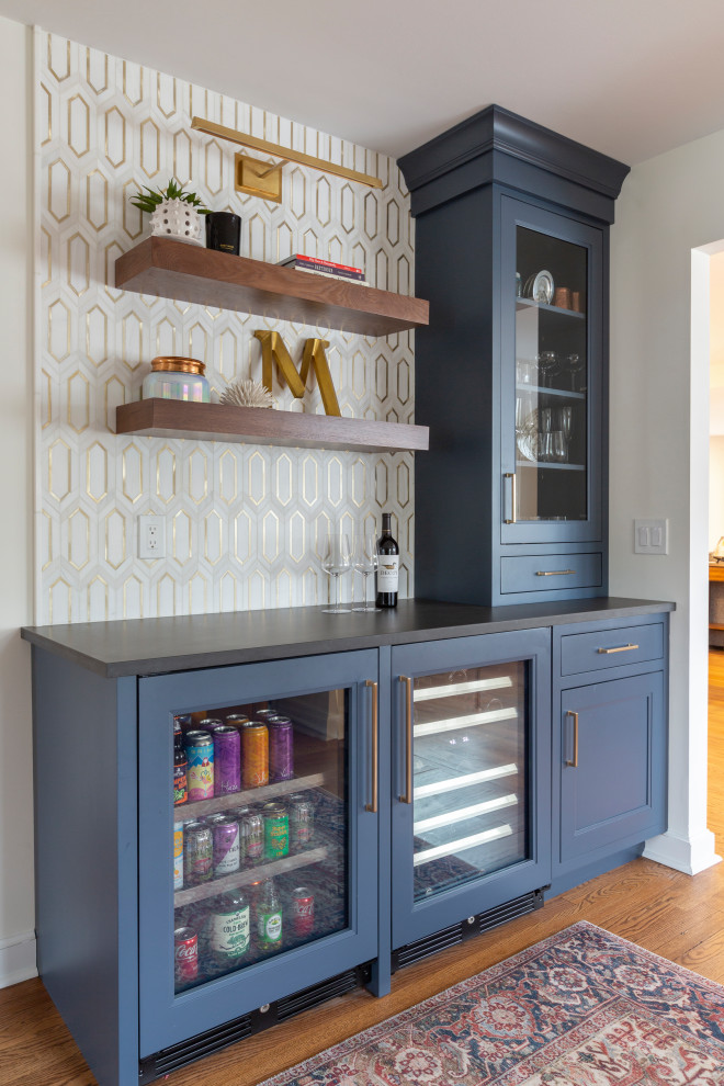 Design ideas for a medium sized classic single-wall dry bar in New York with shaker cabinets, blue cabinets, engineered stone countertops, white splashback, mosaic tiled splashback and black worktops.