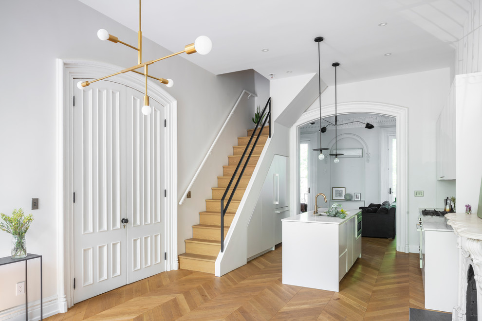 Staircase - large transitional wooden l-shaped mixed material railing staircase idea in New York with wooden risers