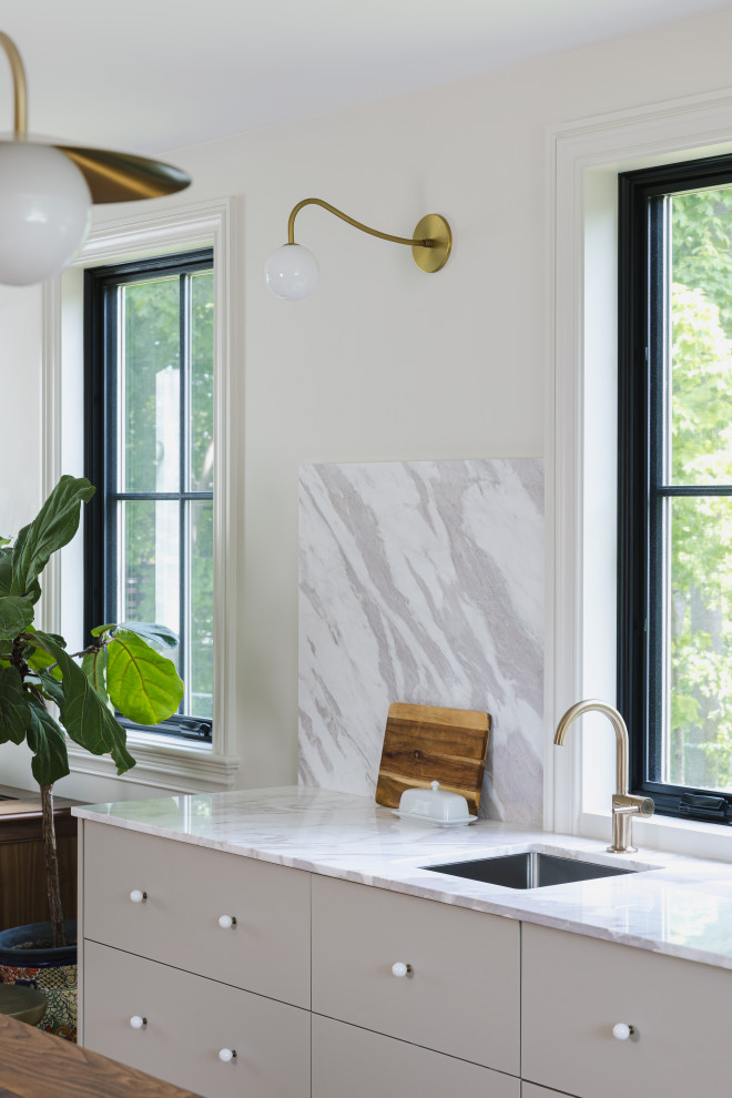 Example of a transitional kitchen design in Ottawa