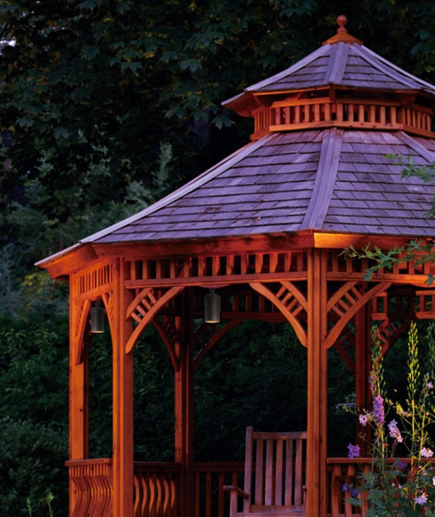 Design ideas for a mid-sized traditional backyard patio in Orlando with a gazebo/cabana.