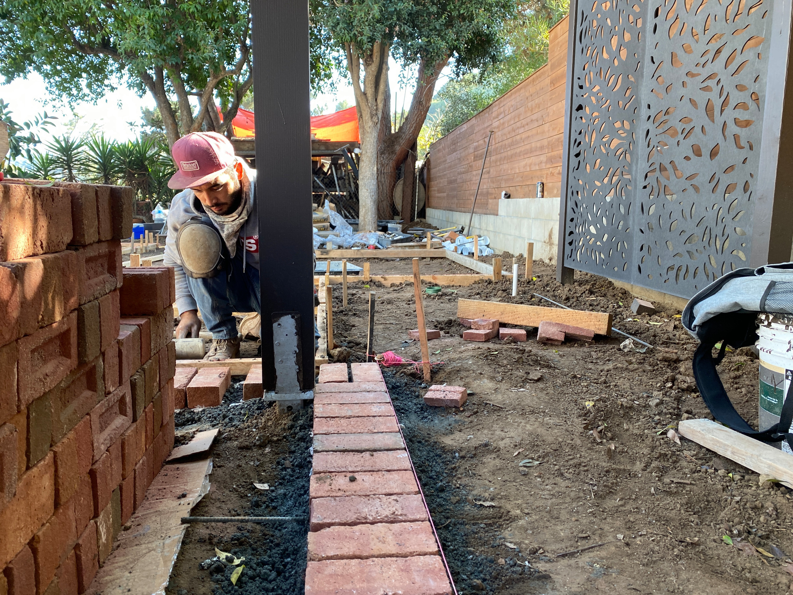 Laying a Brick Border in La Jolla Backyard