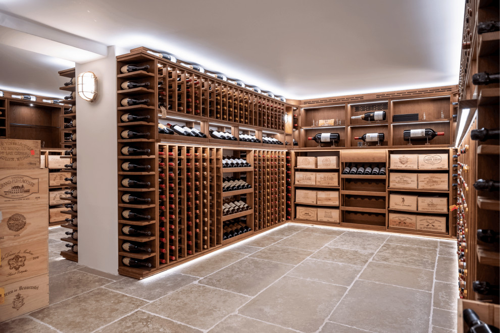 Wine cellar - large traditional wine cellar idea in Other