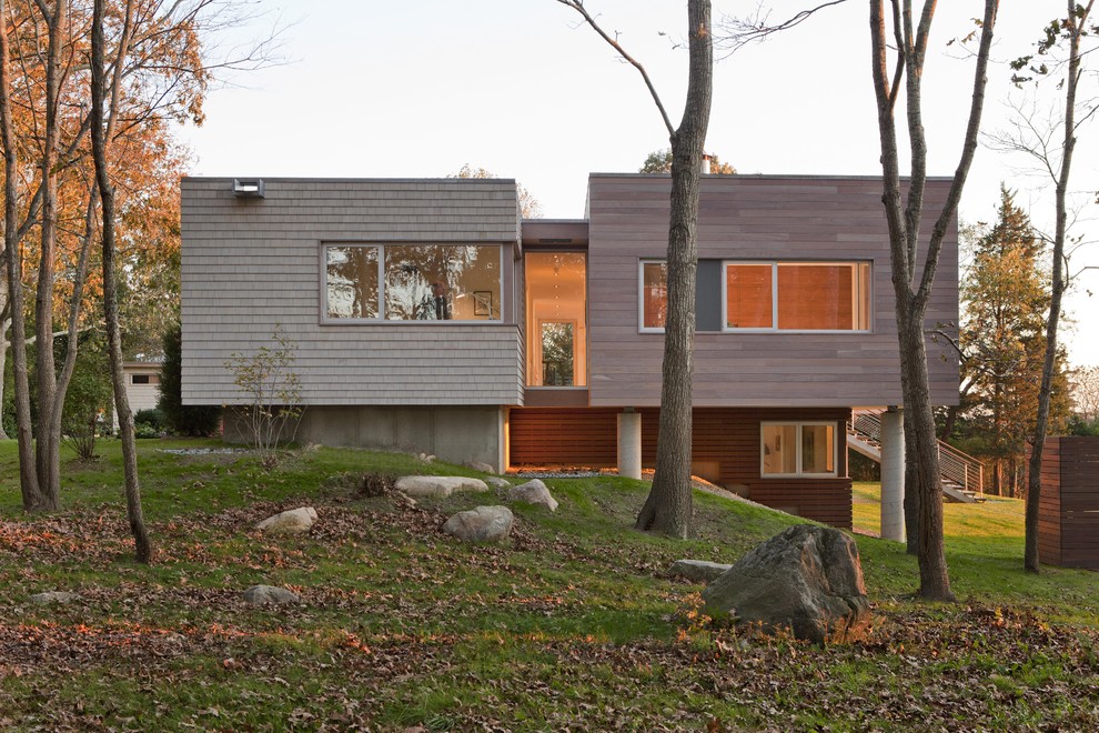 Design ideas for a contemporary exterior in Boston with wood siding.