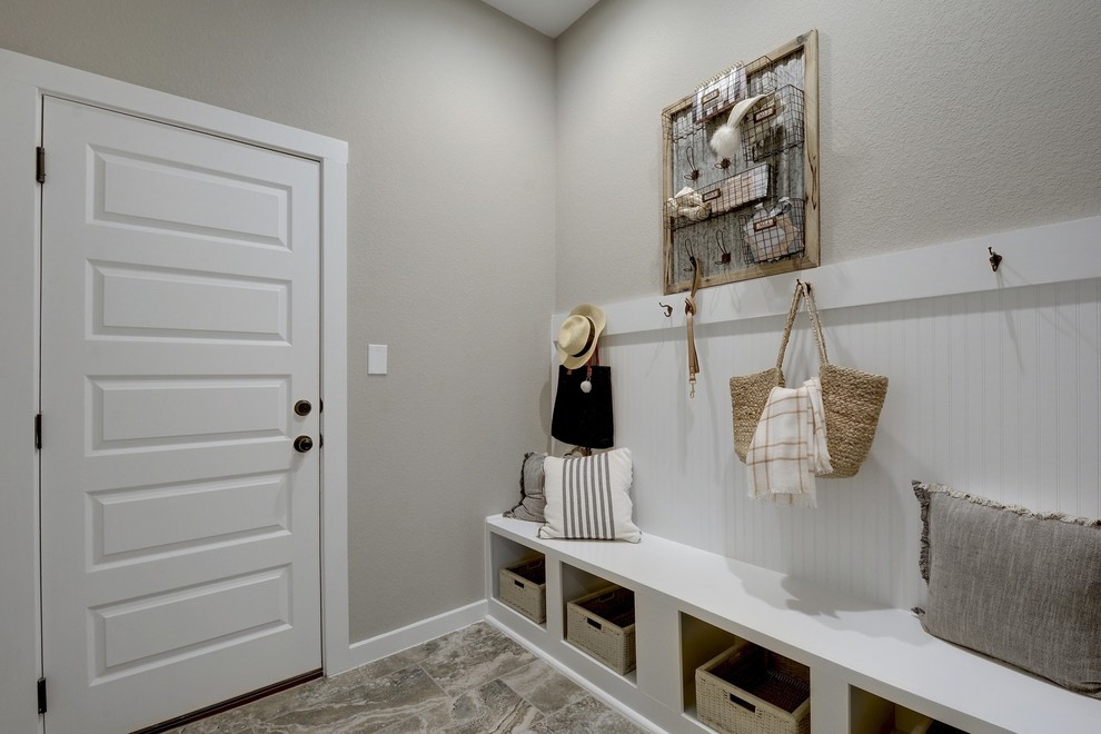 Transitional mudroom in Jacksonville with grey walls, a single front door, a white front door and grey floor.