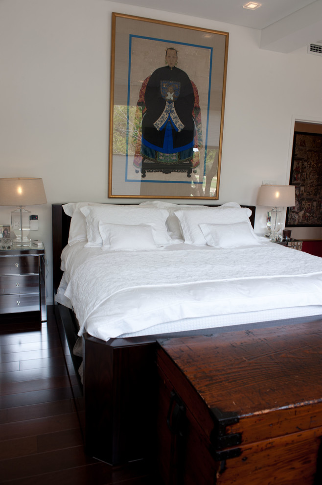 This is an example of a mid-sized eclectic master bedroom in Sydney with white walls.