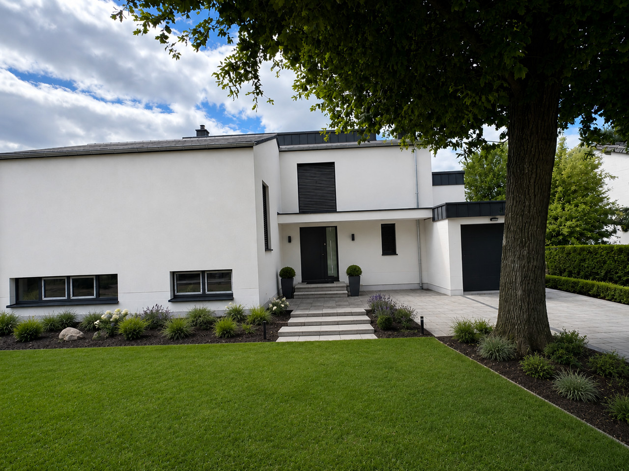 Teilabriss und Neubau eines Zweifamilienhauses