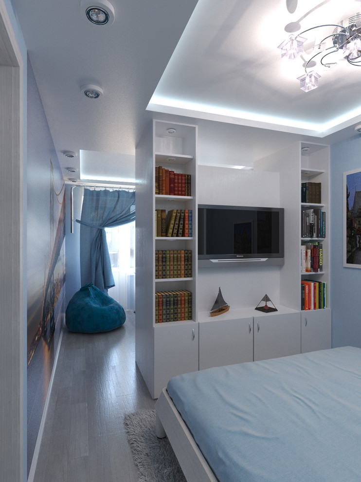 Уютная и многофункциональная комната в голубых тонах.