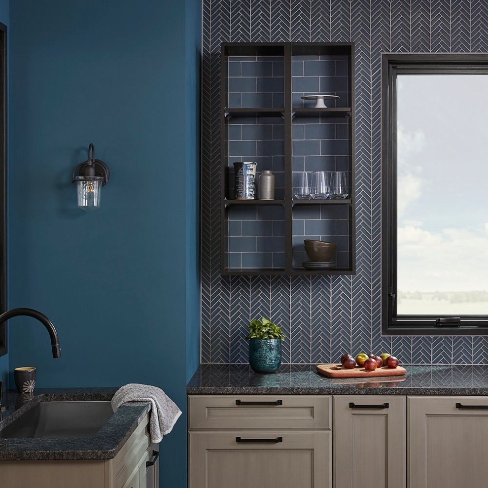 Photo of a transitional kitchen in Denver with shaker cabinets, light wood cabinets, granite benchtops, blue splashback, glass tile splashback and multi-coloured benchtop.