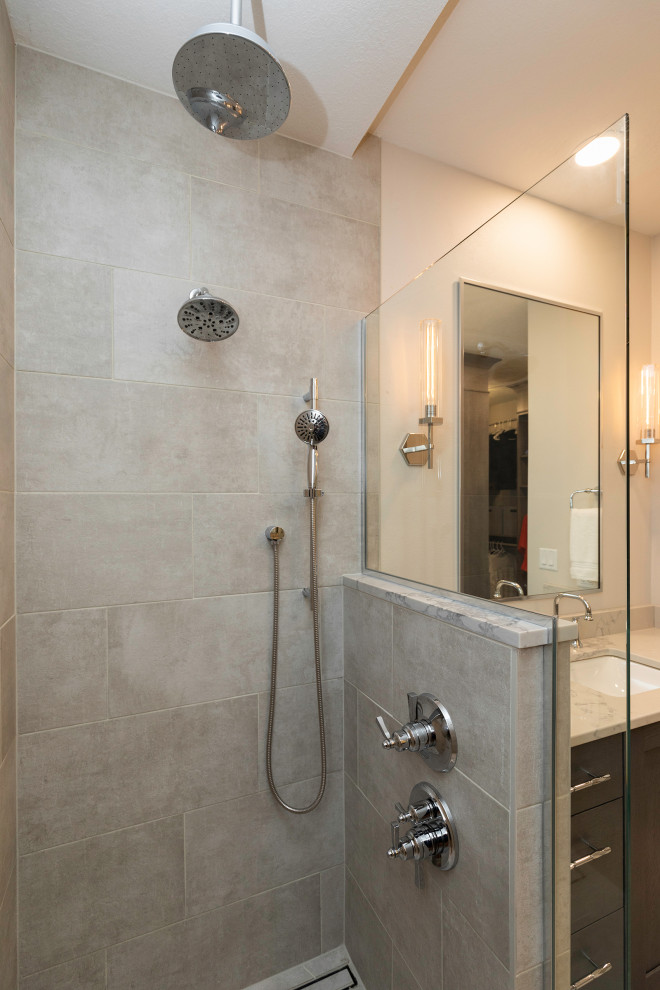 Double shower - mid-sized transitional master porcelain tile, gray floor and single-sink double shower idea in Other with recessed-panel cabinets, gray cabinets, a two-piece toilet, gray walls, an undermount sink, quartz countertops, a hinged shower door, gray countertops and a freestanding vanity