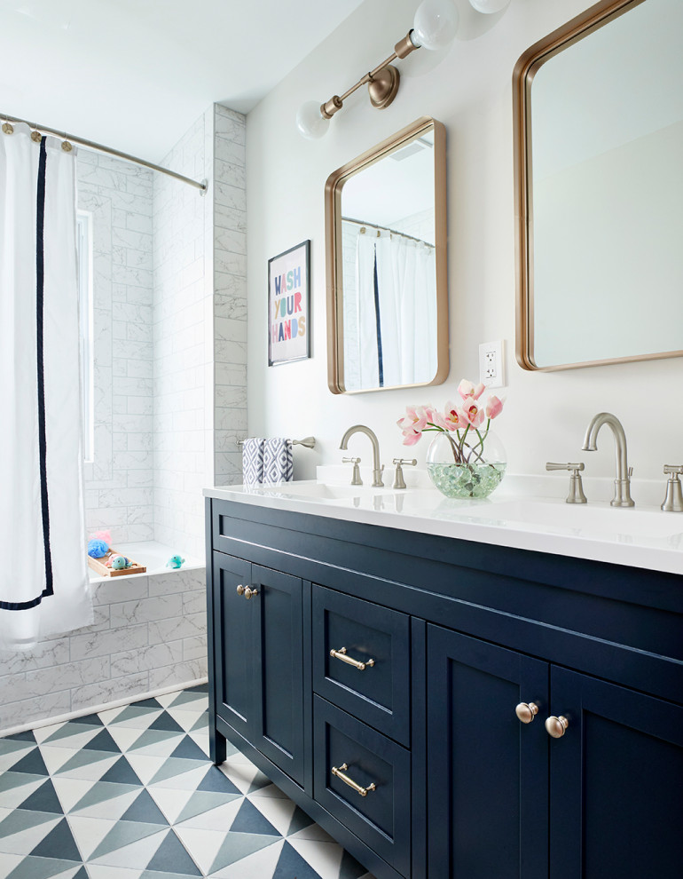 Photo of a large transitional kids bathroom in Other with black cabinets, an alcove tub, a curbless shower, a one-piece toilet, white walls, a shower curtain, white benchtops, a double vanity and a built-in vanity.