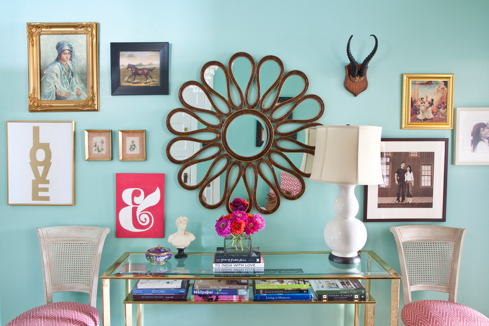 Eclectic entryway in Philadelphia with blue walls.