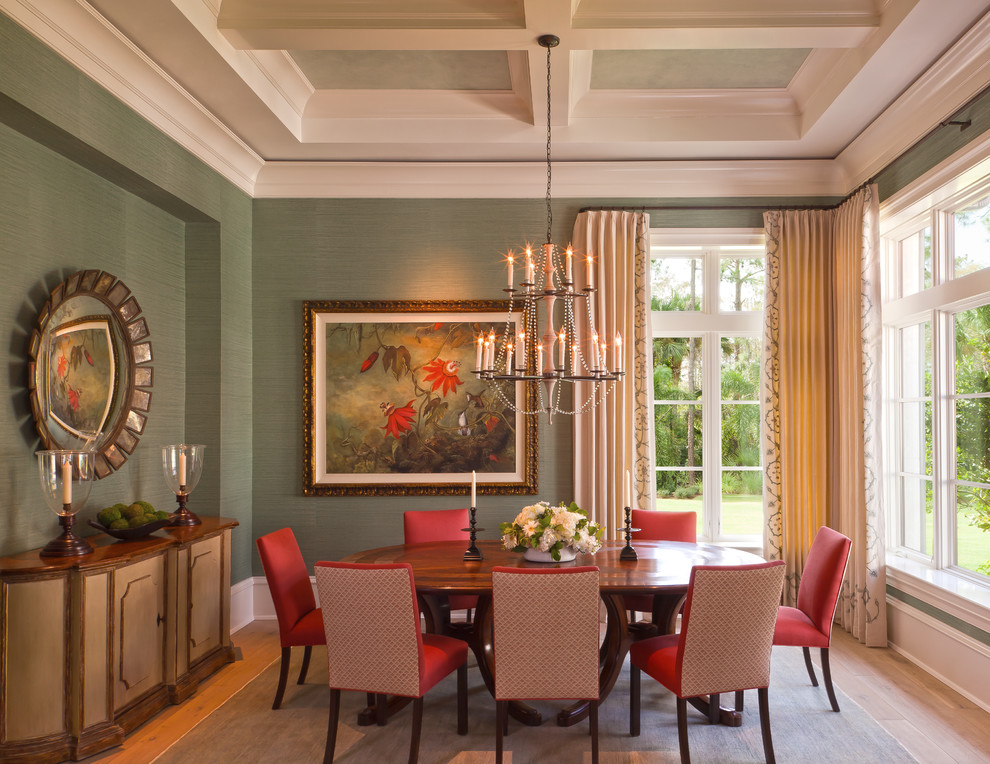 Inspiration for a traditional separate dining room in Boston with green walls, medium hardwood floors and no fireplace.
