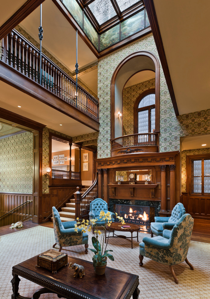 This is an example of a traditional living room in Philadelphia with a standard fireplace and no tv.