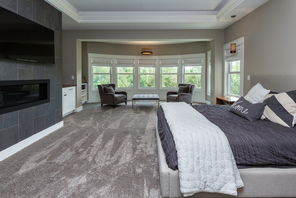 Example of a transitional bedroom design in Cedar Rapids