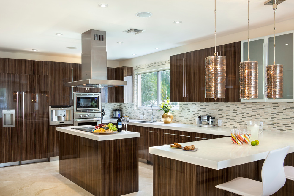 Photo of a large contemporary u-shaped eat-in kitchen in Miami with flat-panel cabinets, dark wood cabinets, multi-coloured splashback, matchstick tile splashback, stainless steel appliances, with island, quartz benchtops, marble floors and an undermount sink.