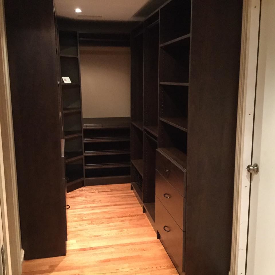 This is an example of a traditional storage and wardrobe in Bridgeport.
