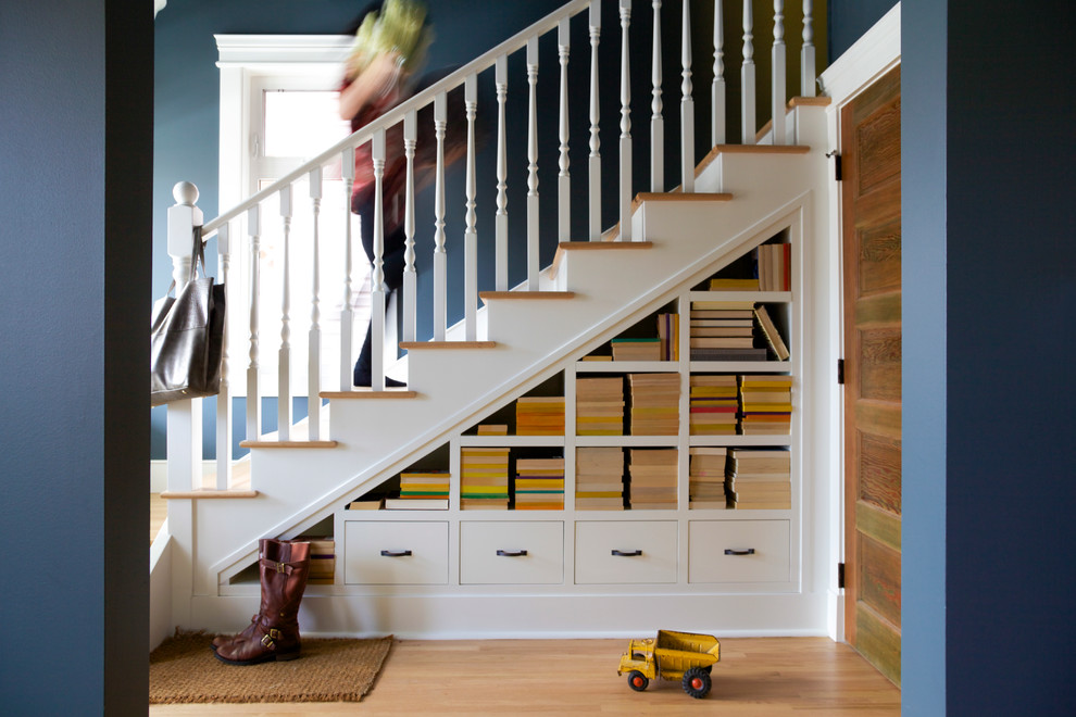 Inspiration for a mid-sized transitional wood l-shaped staircase in Calgary with wood railing.
