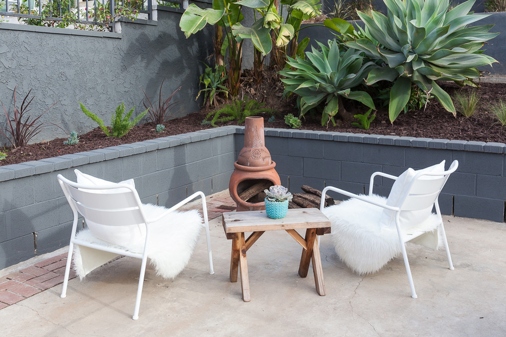 This is an example of a midcentury patio in Other with no cover.