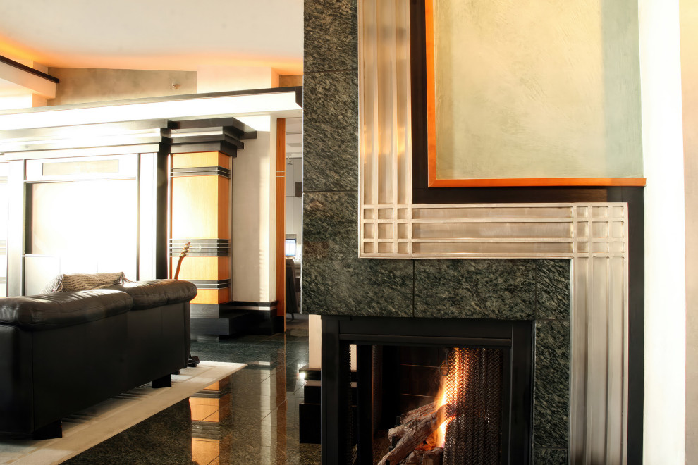 На фото: гостиная комната в стиле модернизм с угловым камином и фасадом камина из металла