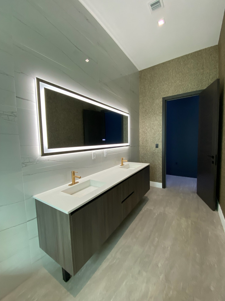 Design ideas for a medium sized modern grey and white bathroom in Miami with double sinks, a freestanding vanity unit, flat-panel cabinets, brown cabinets, a one-piece toilet, multi-coloured tiles, marble tiles, multi-coloured walls, mosaic tile flooring, a built-in sink, granite worktops, multi-coloured floors, a hinged door, white worktops and a drop ceiling.