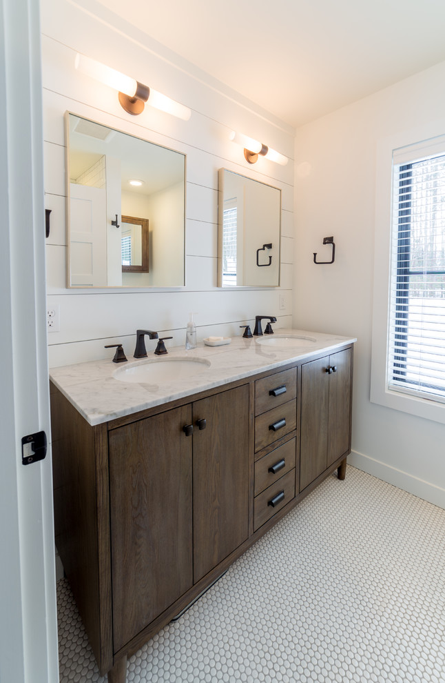 Small country bathroom in Other with flat-panel cabinets, medium wood cabinets, an alcove shower, a two-piece toilet, white tile, mosaic tile, white walls, mosaic tile floors, an undermount sink and marble benchtops.
