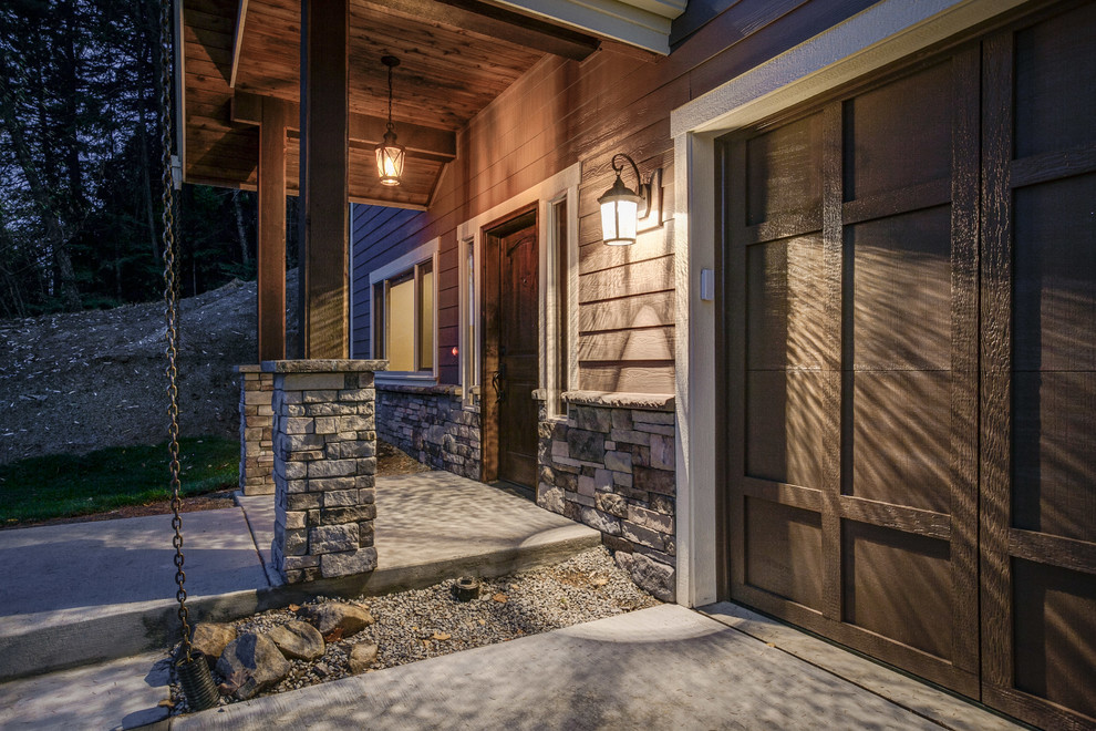 Mid-sized mountain style front door photo in Seattle with a dark wood front door