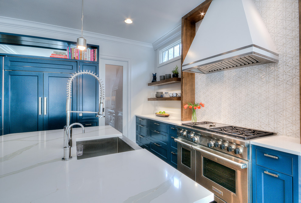 Kitchen - transitional kitchen idea in Austin with white backsplash and stone tile backsplash