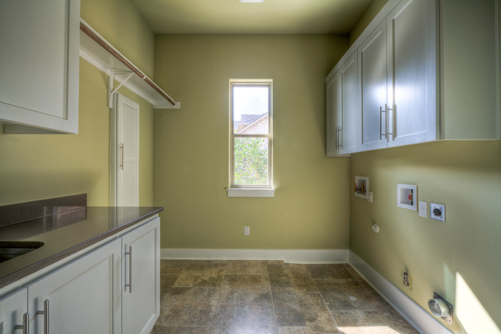 This is an example of a contemporary laundry room in Austin.