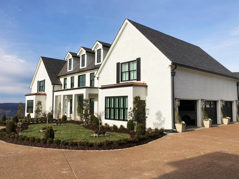 Inspiration for a huge traditional full sun front yard landscaping in Other for winter.