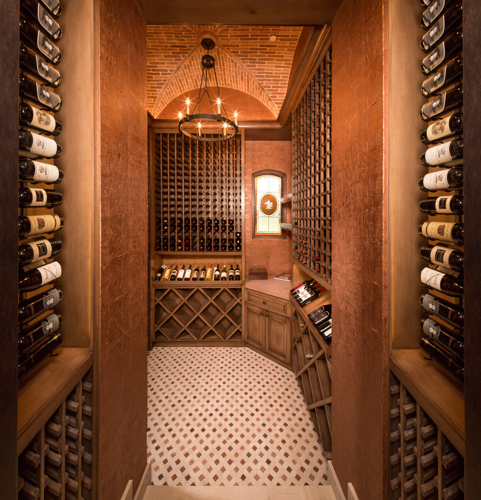 Design ideas for a mediterranean wine cellar in Houston with display racks.