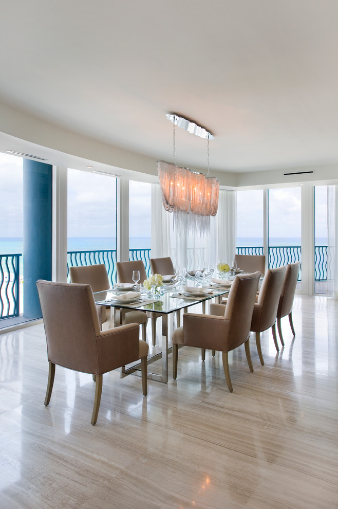 Design ideas for a contemporary dining room in Miami with white walls and ceramic floors.