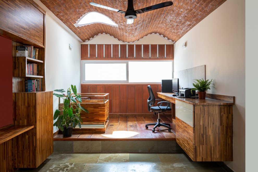 Inspiration for a world-inspired home office in Bengaluru.