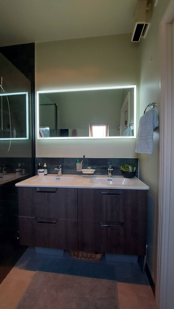 This is an example of a small contemporary master bathroom in Dublin with flat-panel cabinets, dark wood cabinets, an open shower, a one-piece toilet, green tile, porcelain tile, green walls, porcelain floors, a drop-in sink, engineered quartz benchtops, grey floor, an open shower, white benchtops, a double vanity, a floating vanity and recessed.