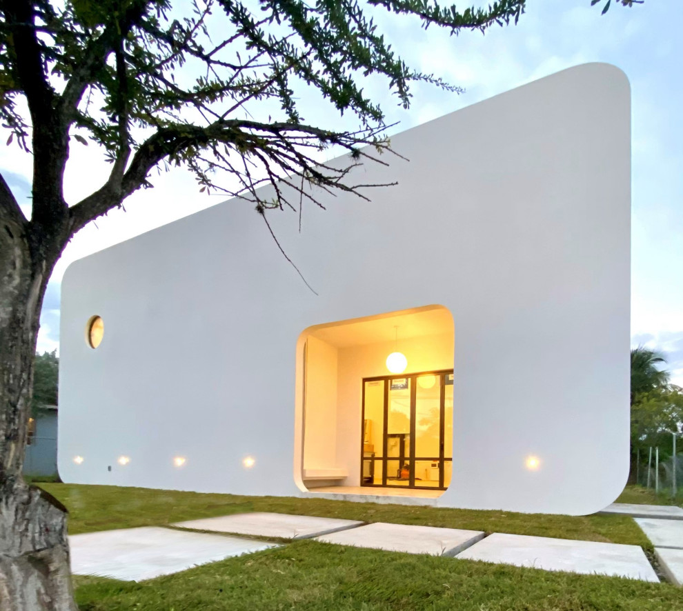 Example of a trendy exterior home design in Miami