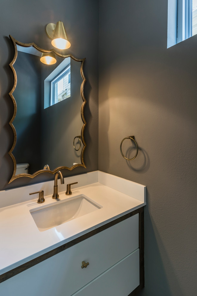 Inspiration for a small transitional medium tone wood floor home design remodel in Dallas with furniture-like cabinets, white cabinets, gray walls, an undermount sink and quartzite countertops