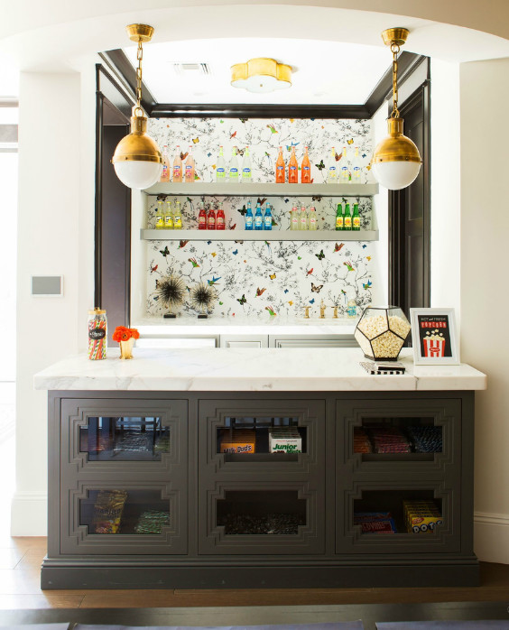 Inspiration for a mid-sized traditional galley home bar in Portland with open cabinets, grey cabinets, marble benchtops, medium hardwood floors and brown floor.