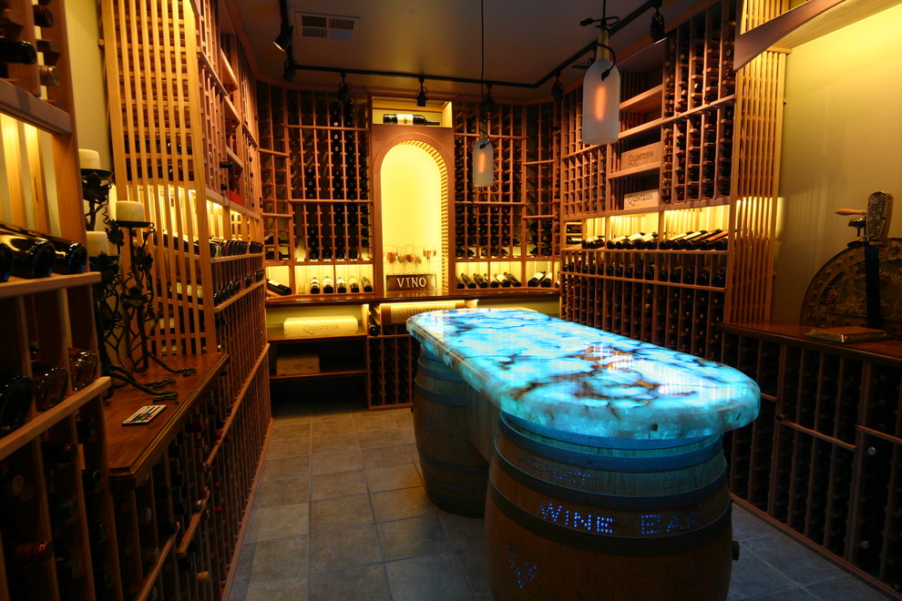 Wine cellar - large traditional ceramic tile wine cellar idea in Sacramento