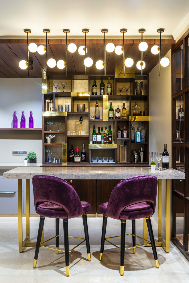 Design ideas for a modern home bar in Mumbai.