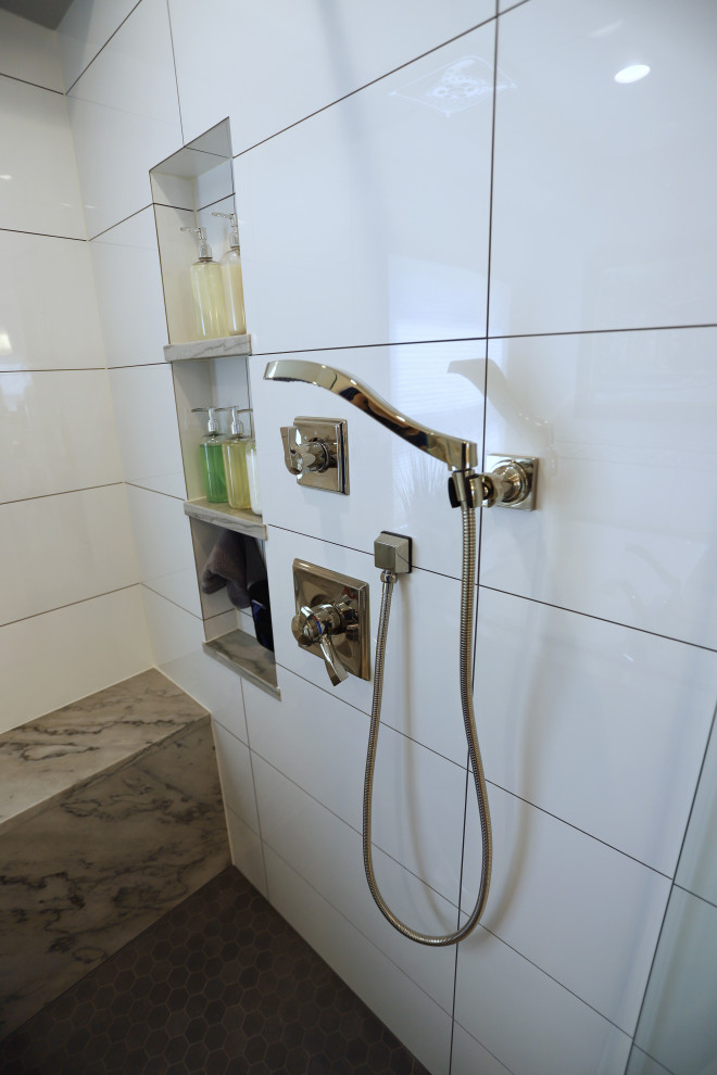 Example of a transitional home design design in Denver